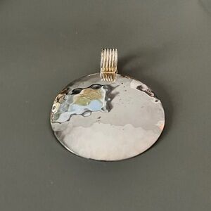 Silver hammered pendant